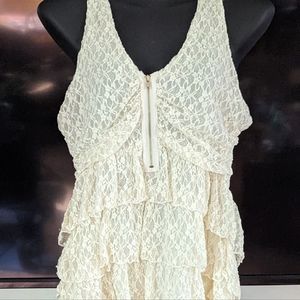 Moda International Ladies lace zip up sexy top. Sleeveless, romantic, ruffles.